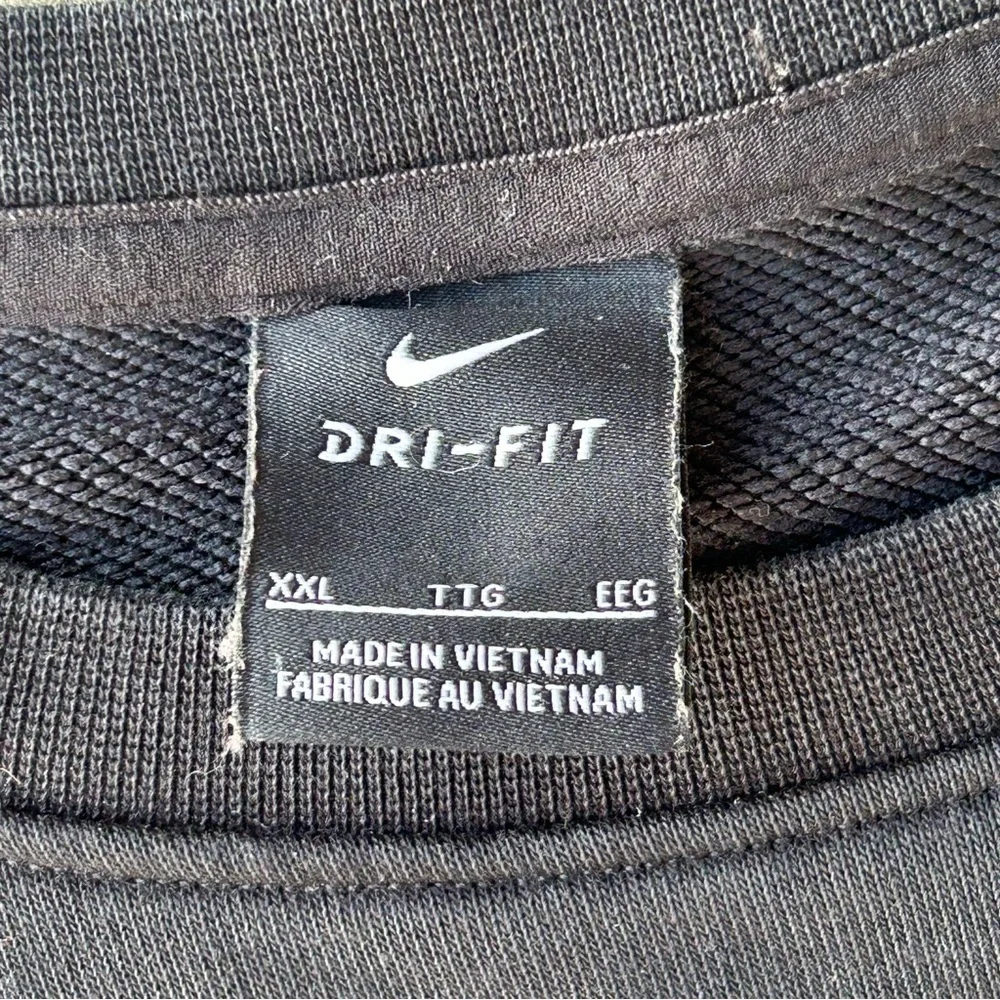 Nike Men's Black Sweater with Red and Blue Accents